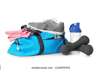 Sports Bag And Gym Equipment On White Background