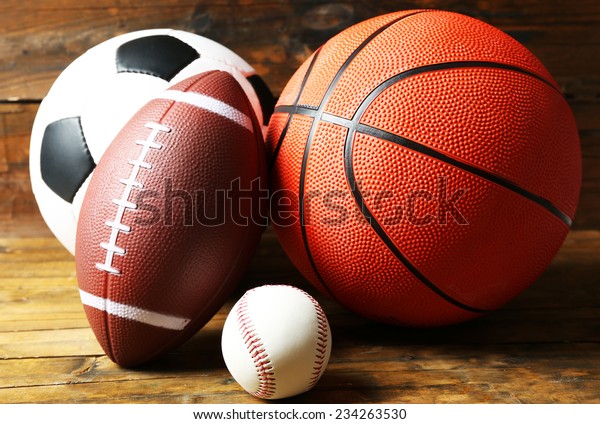 Sports Balls On Wooden Background Stock Photo (Edit Now) 234263530