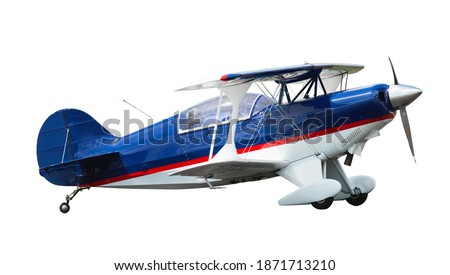 Sports biplane in motion isolated on white background.