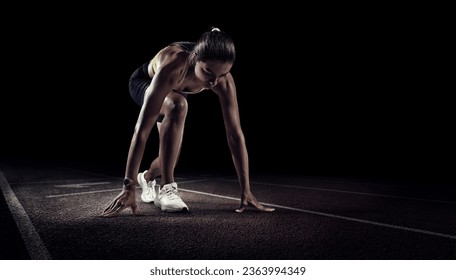 Sports black buckground. Runner on the start. - Powered by Shutterstock