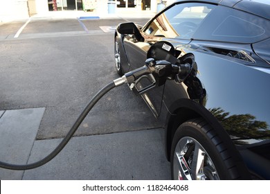 Sports Car Getting Gas