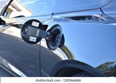 Sports Car Getting Gas At The Pump