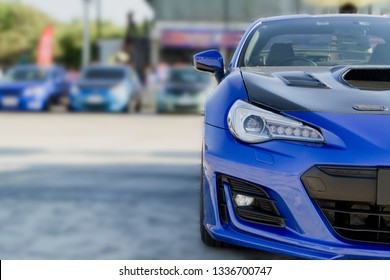 sports car and Used cars, parked in the parking lot of Dealership waiting to be sold and delivered to customers and waiting for the auction with the trading concept and auction in Automotive Industry