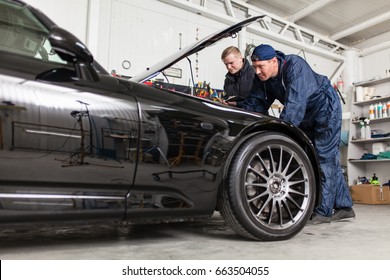 Sports Car In A Workshop