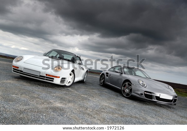 Sports cars under storm\
clouds