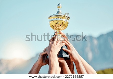 Sports, champion and hands of team with trophy for achievement, goal and success together. Celebration, winner and people holding an awards cup after winning a sport competition or rugby tournament