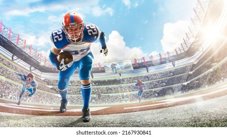 Sports Emotions. American Football In A Large Open Stadium. Young Agile American Football Player Running Fast Towards Goal Line. Touchdown. Fans