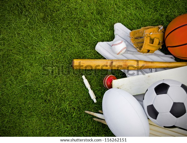 sports equipment on grass, football, rugby,\
baseball, cricket,\
basketball