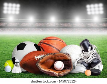 Sports Equipment, Rackets And Balls For All Seasons In Stadium Background With Copy Space.