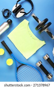 Sports Equipment And T-shirt On Color Table, Top View