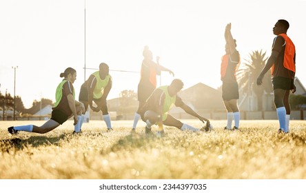Sports, fitness and a rugby team stretching on a field at training in preparation for a game or match together. Exercise, teamwork and warm up with an athlete group getting ready for practice - Powered by Shutterstock