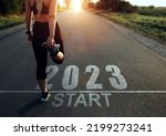 Sports girl who wants to start the year 2023. Concept of new professional achievements in the new year and success. New Year 2023 with new ambitions, challenge, plans, goals and visions.