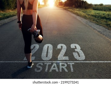 Sports girl who wants to start the year 2023. Concept of new professional achievements in the new year and success. New Year 2023 with new ambitions, challenge, plans, goals and visions. - Shutterstock ID 2199273241
