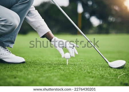 Sports, golf ball and tee with hand of black man on field for training, tournament and challenge. Start, competition match and ready with athlete and club on course for action, games and hobby