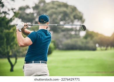 Sports, golf and man swing driver on field for exercise, training or workout match. Fitness, golfing course and male golfer swinging club for practice, competition or game for recreation outdoors.