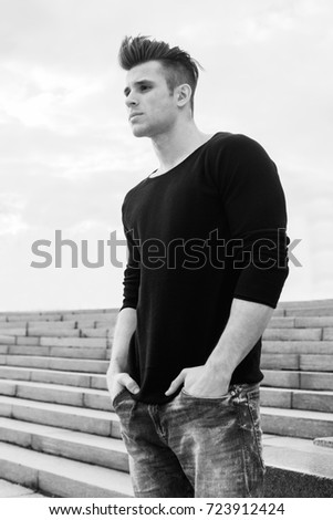 Similar – Image, Stock Photo Young sportsman drinking water after jogging