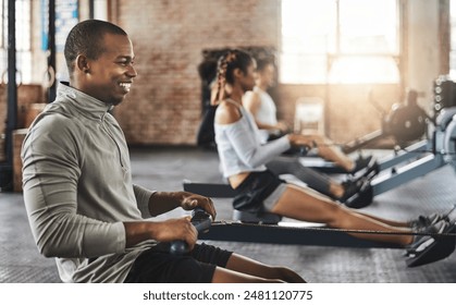 Sports, gym and man on rowing machine for health, wellness and body workout with class. Endurance, exercise and male athlete on ergometer equipment for cardio cross training in fitness center. - Powered by Shutterstock