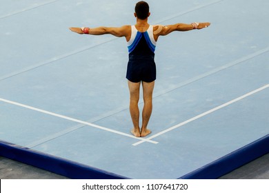Sports Gymnastics Back Athlete Gymnast Exercises On Floor