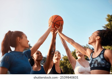 Sports, hands and people with ball in huddle for fitness, support and motivation in outdoor games. Basketball, women and group of female athletes on court for practice match, exercise or training - Powered by Shutterstock