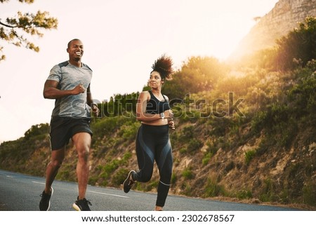 Sports, health and couple running by mountain training for race, marathon or competition. Fitness, nature and African runners doing outdoor cardio workout or exercise on road trail together at sunset