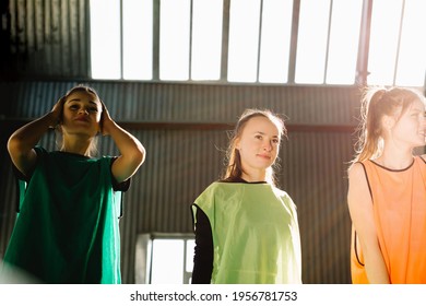 Sports, Human Emotion Fan People, Sad Young Girls, Sport Fans Supporting The Team In The Gym. Crying Emotional Women Screams In Colorful Bright Lights Indoors. Facial Expression . High Quality Photo