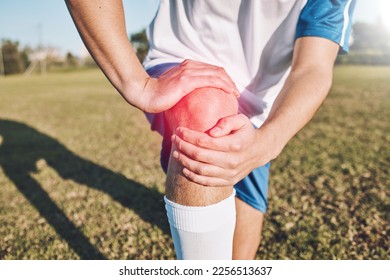 Sports, knee pain and hands on field or football competition, training and exercise injury with anatomy and red overlay. Soccer, fitness and athlete person or man leg for medical emergency or risk - Powered by Shutterstock