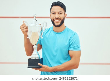 Sports man, portrait smile and trophy for winning competition, challenge and success indoor court. Male athlete, happy and award for squash champion, achievement and contest or game winner in arena - Powered by Shutterstock