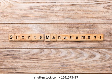 Sports Management Word Written On Wood Block. Sports Management Text On Wooden Table For Your Desing, Concept.