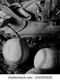 Sports Nostalgia Still Life With Used Baseball Equipment Closeup In Black And White.