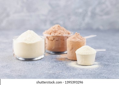 Sports Nutrition, Fitness Diet And Food Concept -  Protein Shake  Powder  On Grey Background