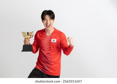 Sports Photo image of a male athlete holding a trophy