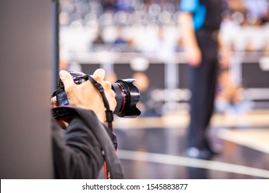 Sports Photographer At  Basketball Game 