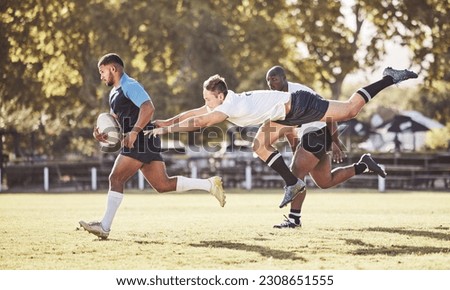 Sports, rugby and men in action on field for match, practice and game in tournament or competition. Fitness, teamwork and strong players tackle for exercise, training and performance to win ball
