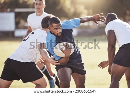 Sports, rugby and men running on field for match, practice and game in tournament or competition. Fitness, teamwork and group of players tackle for exercise, training and performance to win ball