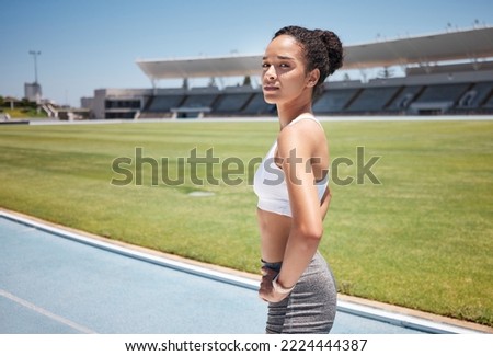 Sports, runner and portrait of woman in stadium ready for training, exercise or workout. Fitness, health or black female athlete on outdoors race track preparing for running, marathon or olympic race