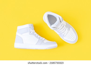 Sports Shoes, Sneakers With Shoelaces On A Yellow Background. Sport Lifestyle Concept Top View Flat Lay.