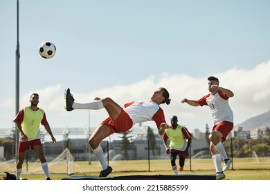 Sports, soccer and soccer player with team and soccer ball in power kick while playing on soccer field. Energy, fitness and football with football players competing in training, exercise and practice - Powered by Shutterstock