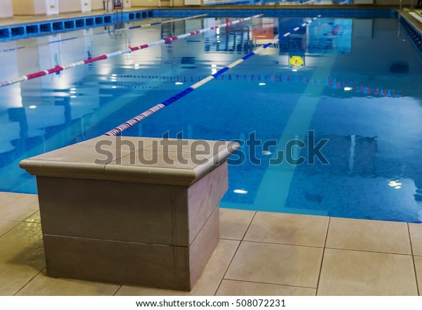 Sports
Swimming Pool. Interior bath sports pool, divided swimming lanes
for swimmers, tables to start during
competitions