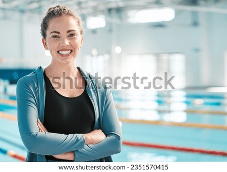 Sports, swimming pool or portrait of happy woman with arms crossed ready for exercise or training. Healthy athlete swimmer, smile or confident female personal trainer in fitness club for wellness