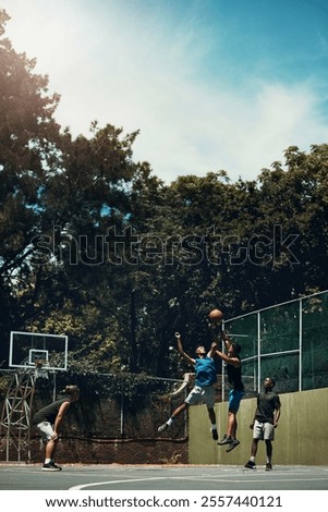 Similar – Image, Stock Photo Young talented basketball player is shooting hoops on his outdoor court and training for future games and tough situations. Preparing for the season. Shooting the basket