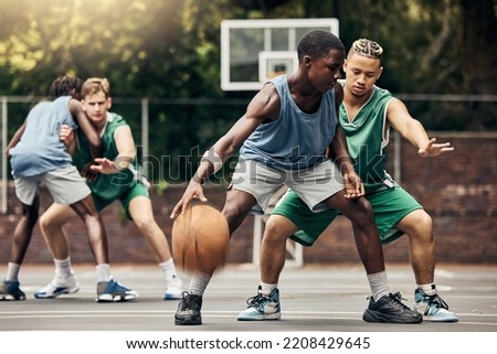 Similar – Image, Stock Photo Young talented basketball player is shooting hoops on his outdoor court and training for future games and tough situations. Preparing for the season. Shooting the basket