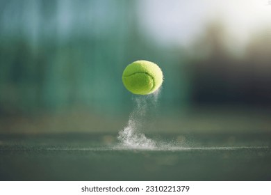 Sports, tennis and a ball bouncing on a court outdoor during a game, competition or training with chalk. Fitness, exercise and club with still life sport equipment outside for a workout or match - Powered by Shutterstock