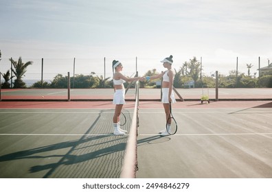 Sports, tennis and women on court with handshake for playing game, practice and training. Teamwork, fitness and people with shaking hands for congratulations for exercise, workout and match outdoors - Powered by Shutterstock