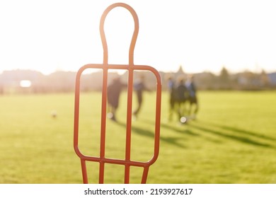 Sports Training Metal Dummy. Football Soccer Free Kick Training Dummy. Sports Training Background. Soccer Team On Training Practice Session On A Sunny Day. Football Players In The Blurred Backgr