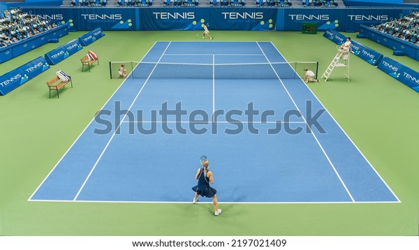 Sports\
TV Broadcast of Female Tennis Championship Match Full Set. Two\
Professional Women Athletes Compete, Hit Fault Shot. Network\
Channel Television With Audience. High Angle\
View.