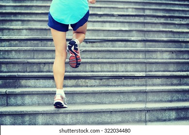 Sports Woman Legs Running Up On Stone Stairs 