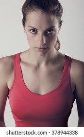 Sports Woman With Look Of Determination. Dark Gritty Portrait