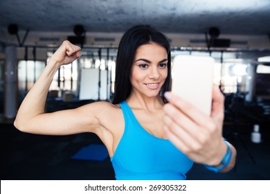 Sports Woman Making Selfie On Smartphone At Gym