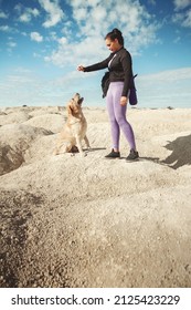 Sports Woman Single Hiker With Backpack On Mountain Standa And Training Dog Labrador Retriever, Concept Turism, Wellness Turist, Hiking, Friendship With Pet, Copy Space