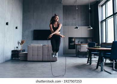 Sportsgirl With Skipping Rope At Home.